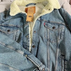 Levi authentic Jean jacket with Sherpa lining brand new with tags!